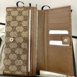 Gucci Portafoglio Continental tela Signature pelle marrone