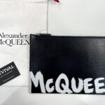 Alexander McQueen Pochette pelle nera stampa logo